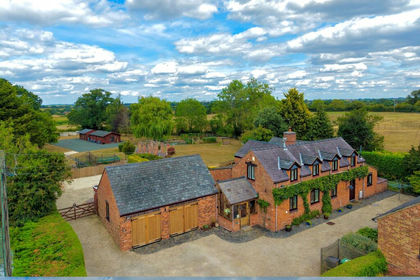 1.1 acres of Barn Conversion for sale in Bronington