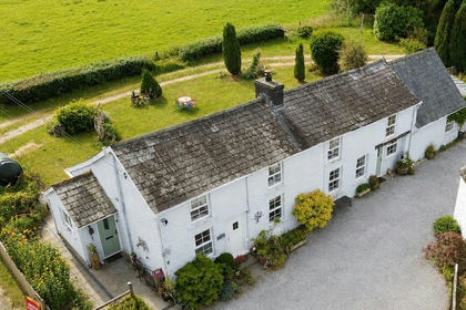 2.8 acres of House with Land for sale in Llanfair-ar-y-bryn